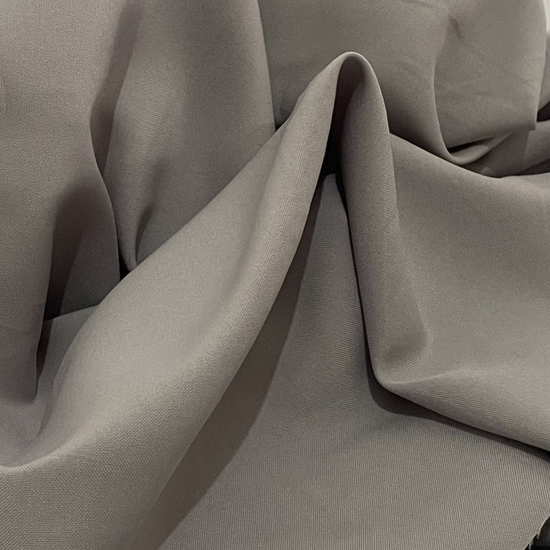 Edullinen minimatta kangas 100 % harmahtava beige polyesteri
